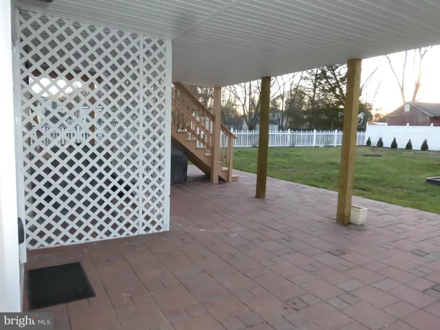 a view of a yard with trees