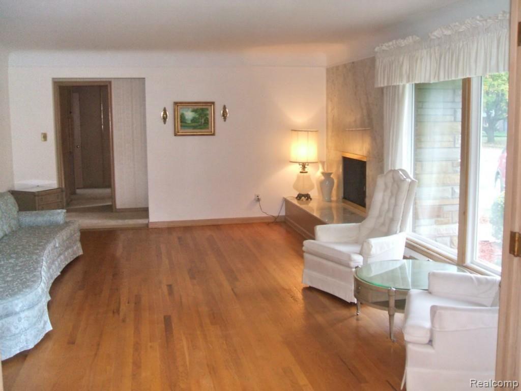 355 South Cranbrook Cross Road Bloomfield Hills, MI 48301 - Photo 3 of 25 Living Room With Fireplace
