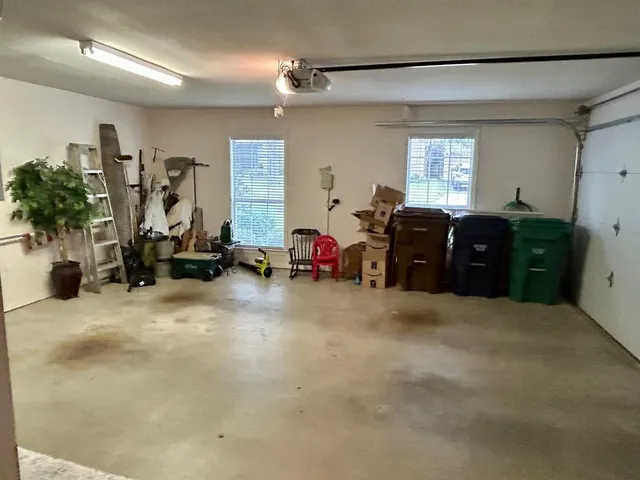 a living room with furniture window and gym equipment