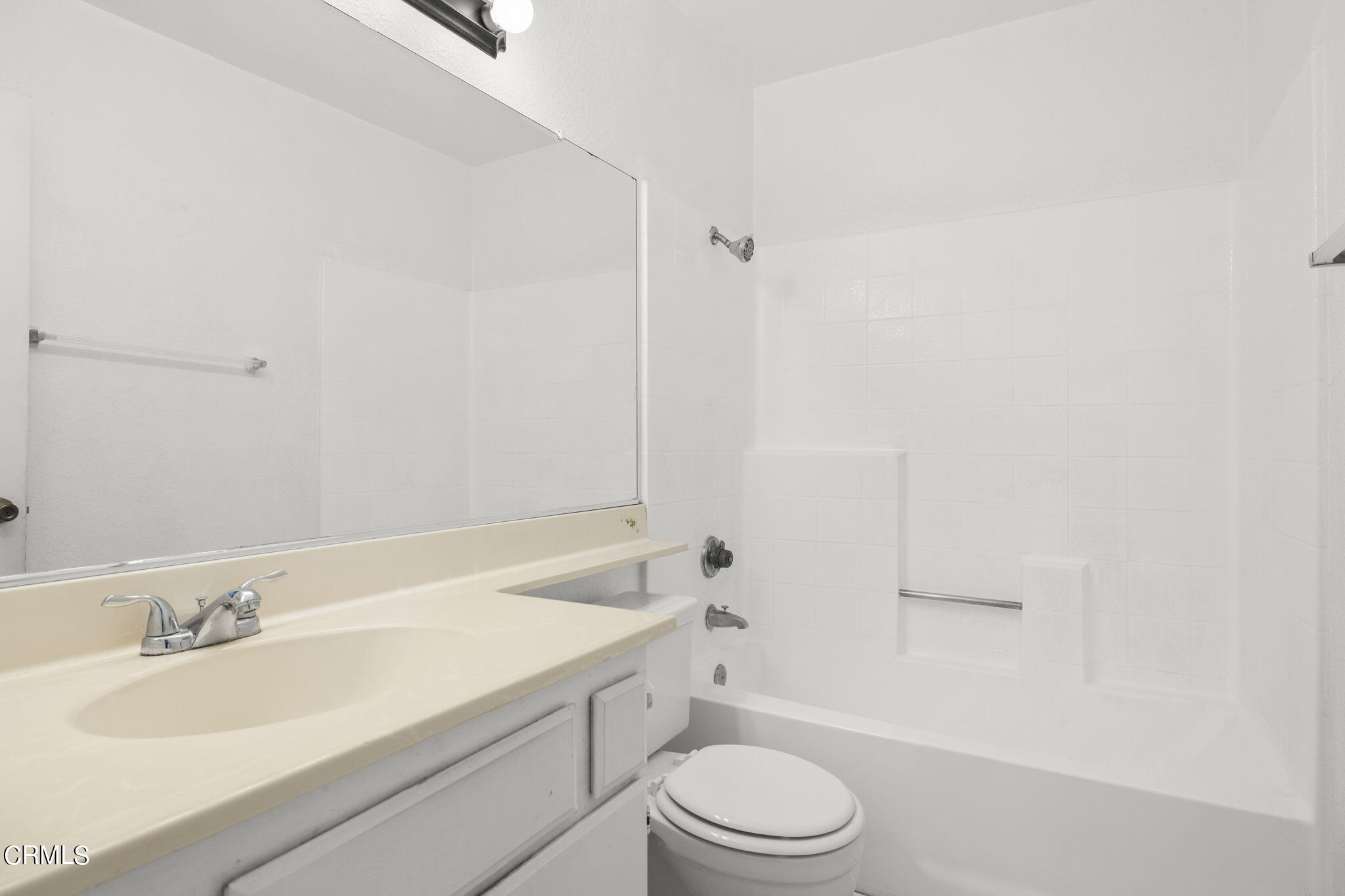 5182 Columbus Place Oxnard, CA 93033 - Photo 17 of 39 a bathroom with a sink a toilet and shower