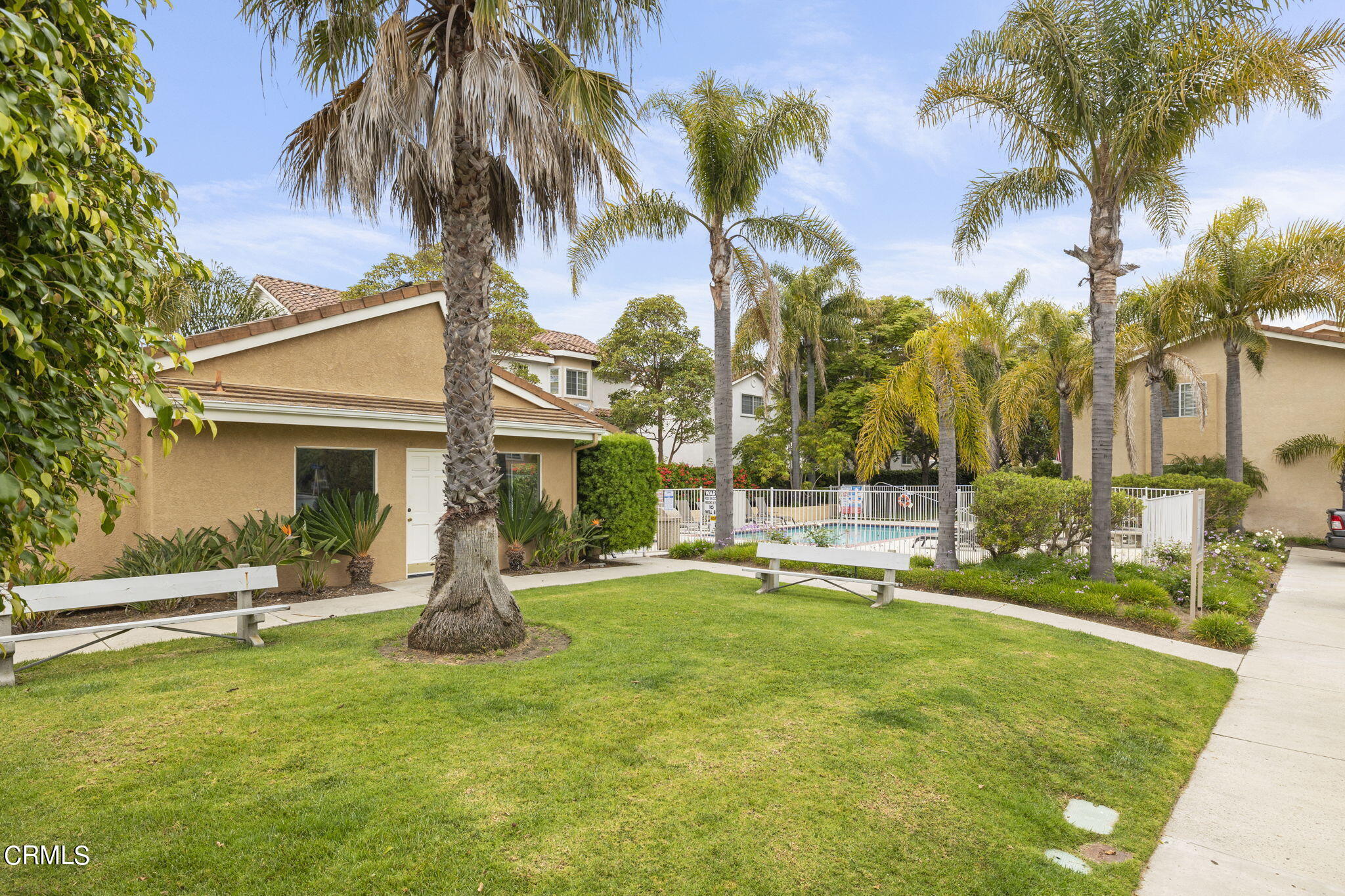 5182 Columbus Place Oxnard, CA 93033 - Photo 31 of 39 a view of a house with swimming pool and a tree