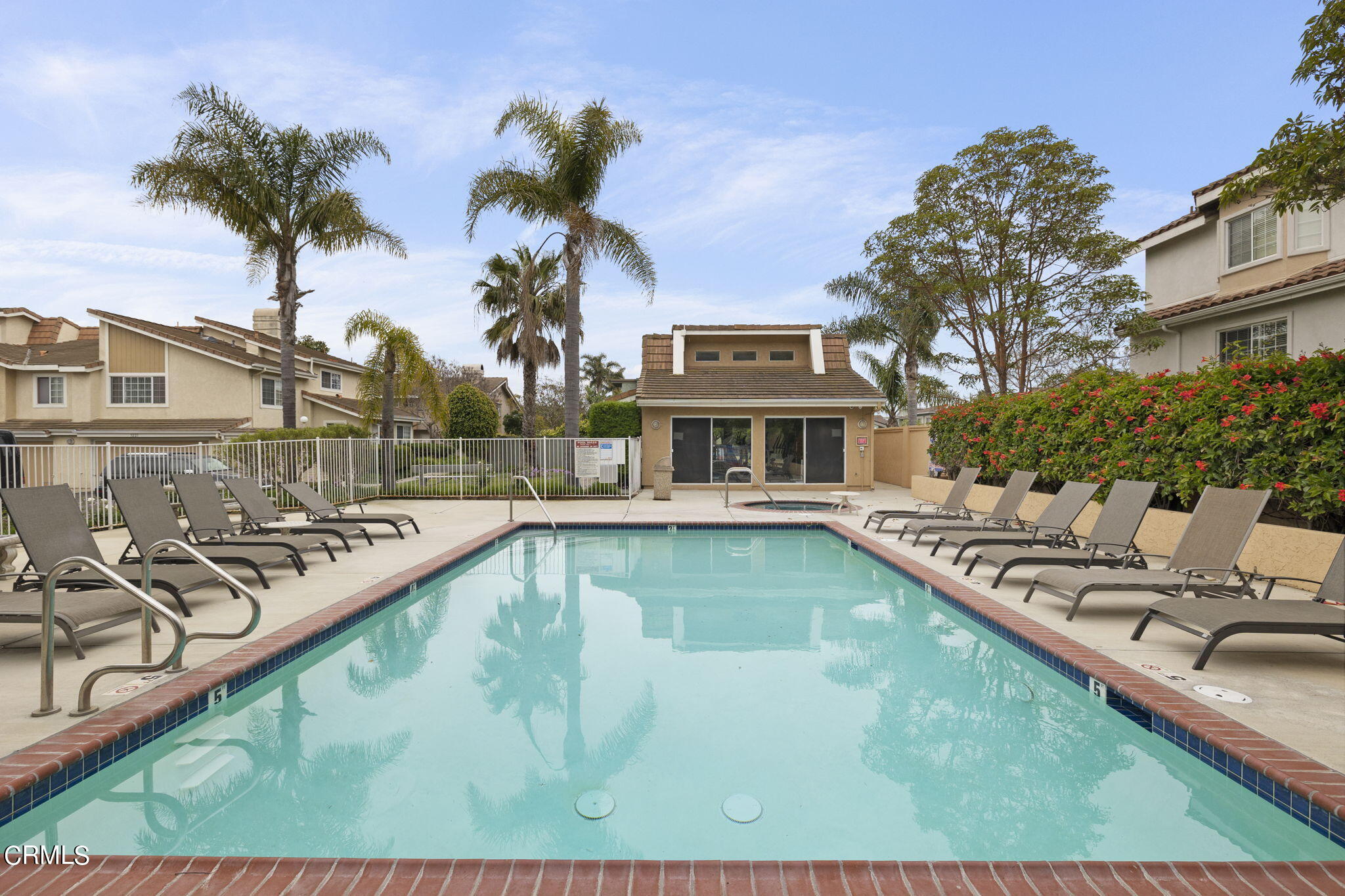 5182 Columbus Place Oxnard, CA 93033 - Photo 32 of 39 a view of a swimming pool with a lounge chairs