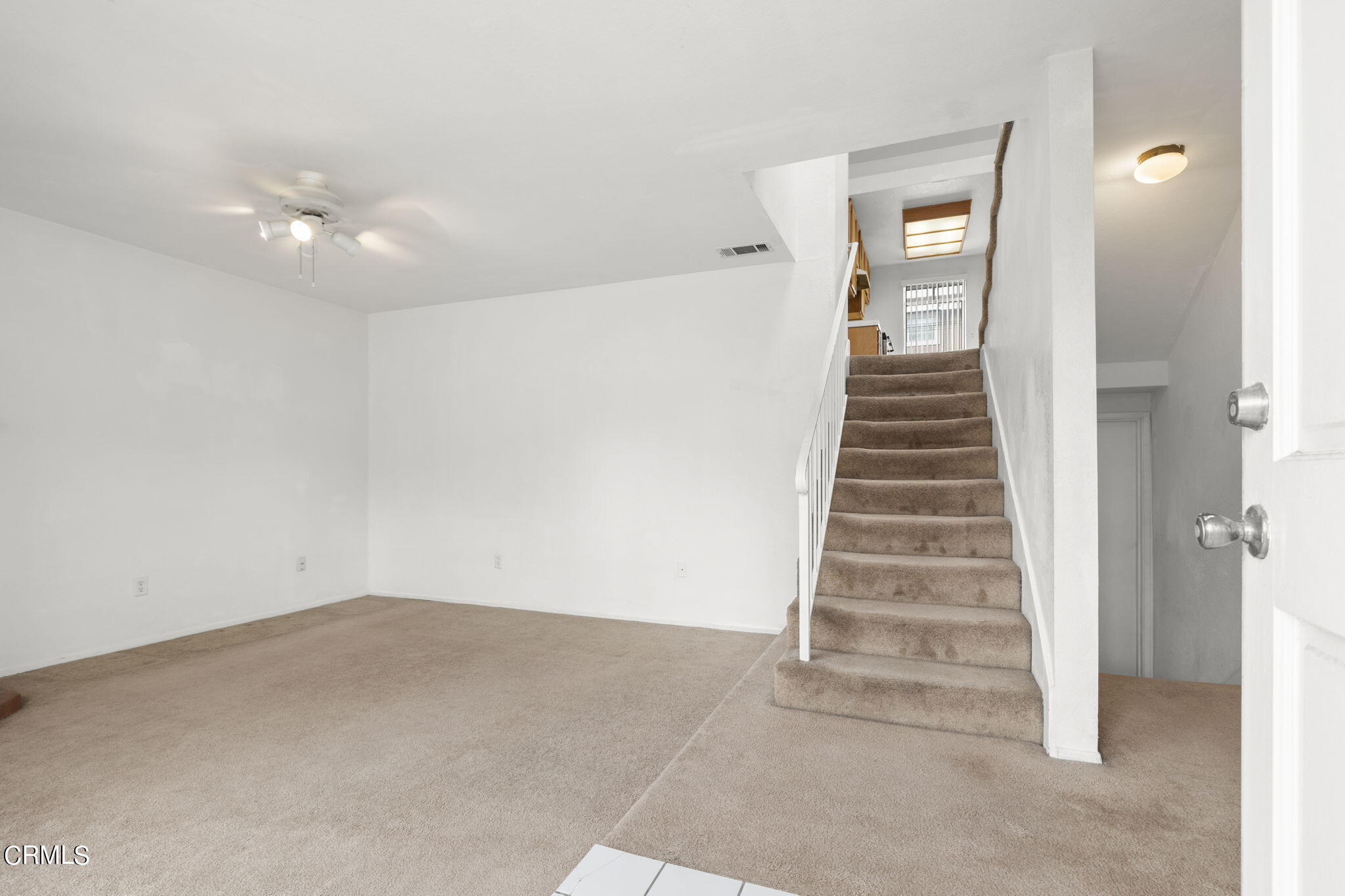 5182 Columbus Place Oxnard, CA 93033 - Photo 9 of 39 a view of a hallway with stairs