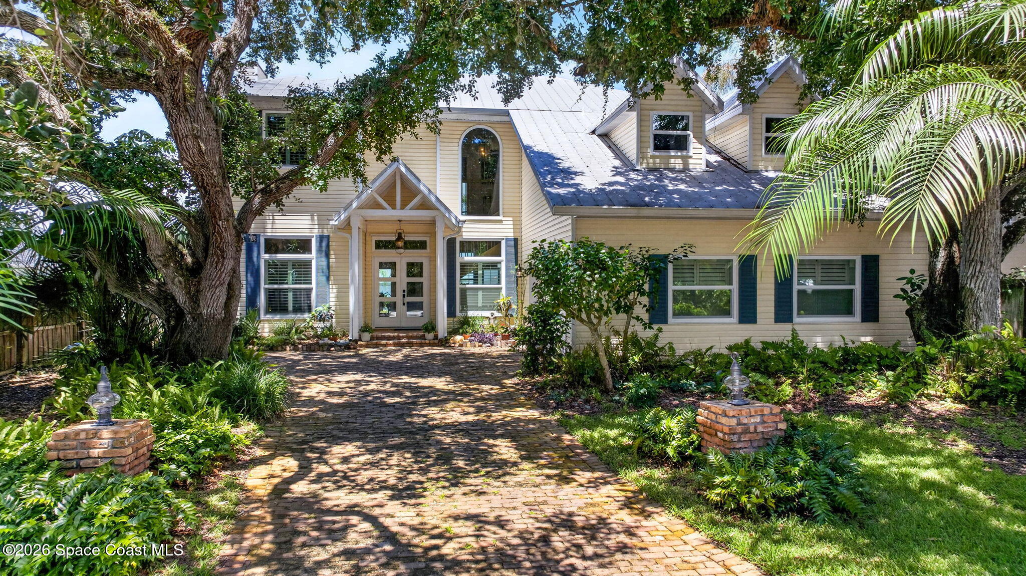 5930 Riverside Drive Melbourne Beach, FL 32951 - Photo 1 of 65 Drive to Front of Home