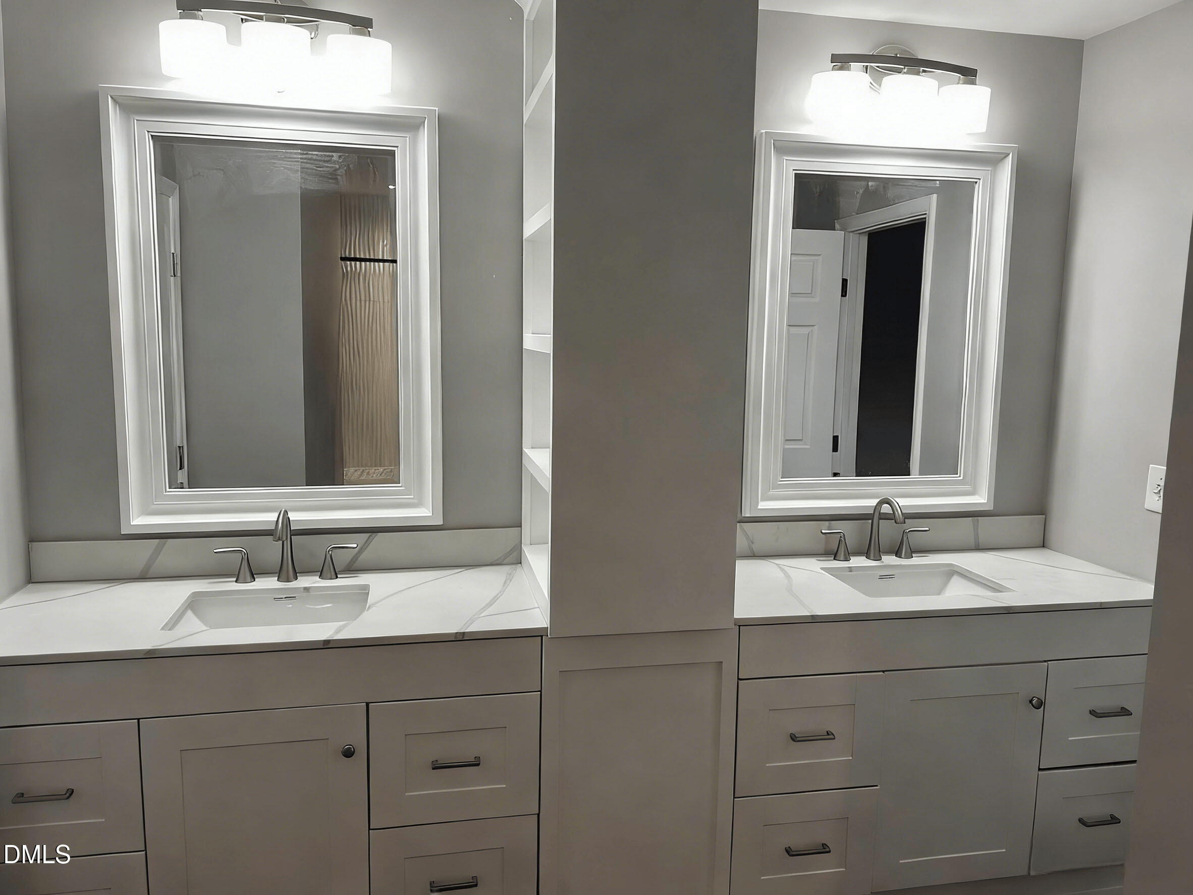 409 Rockingham Street Carthage, NC 28327 - Photo 33 of 56 a bathroom with double sink and a mirror