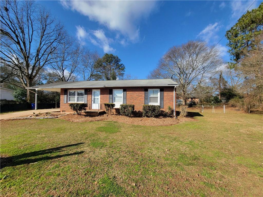 1605 Gilston Court Decatur, GA 30032 - Photo 1 of 1 a view of a house with swimming pool and sitting area