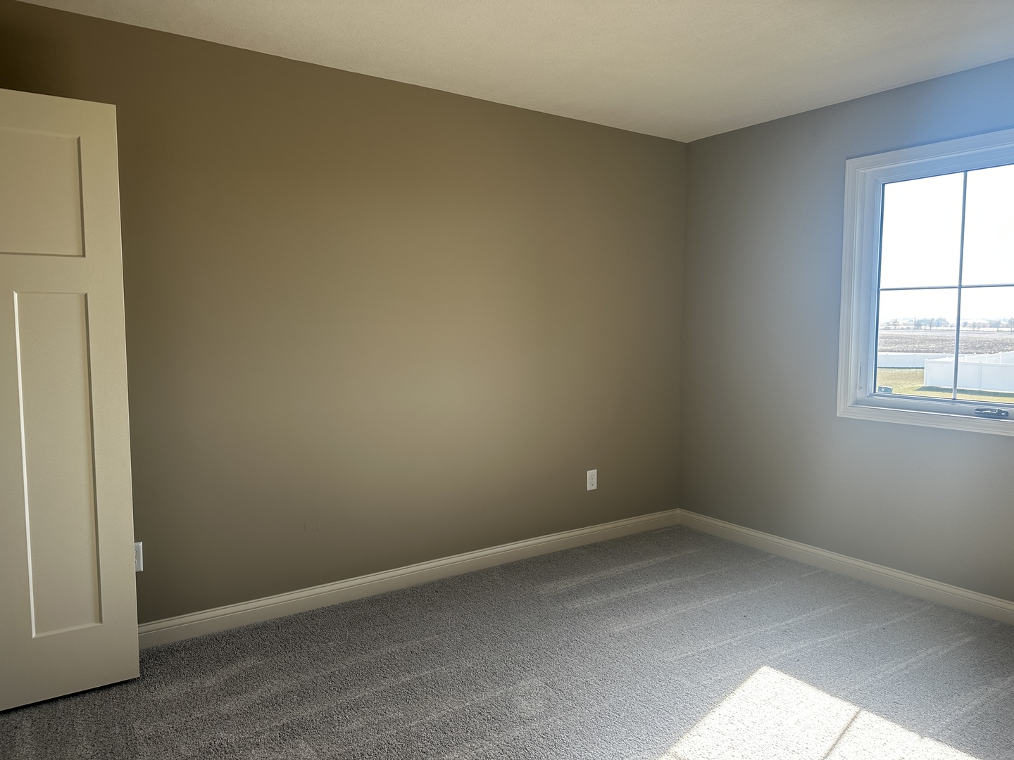 2 Roscoe Court Bloomington, IL 61705 - Photo 13 of 16 an empty room with a window