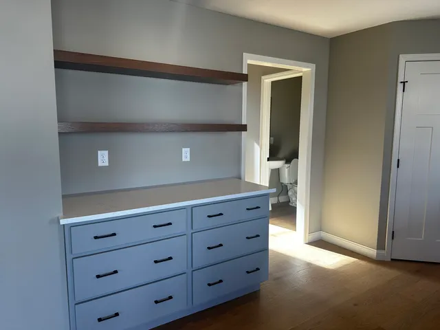 a kitchen with a cabinets and a dresser