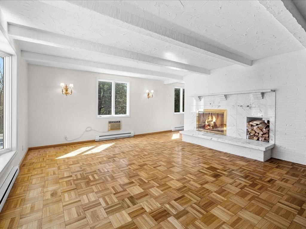 18 James Road Duxbury, MA 02332 - Photo 24 of 34 a view of a livingroom with wooden floor and a window