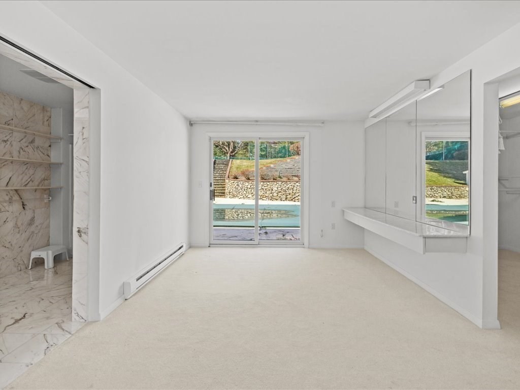 18 James Road Duxbury, MA 02332 - Photo 26 of 34 a view of an empty room with a window