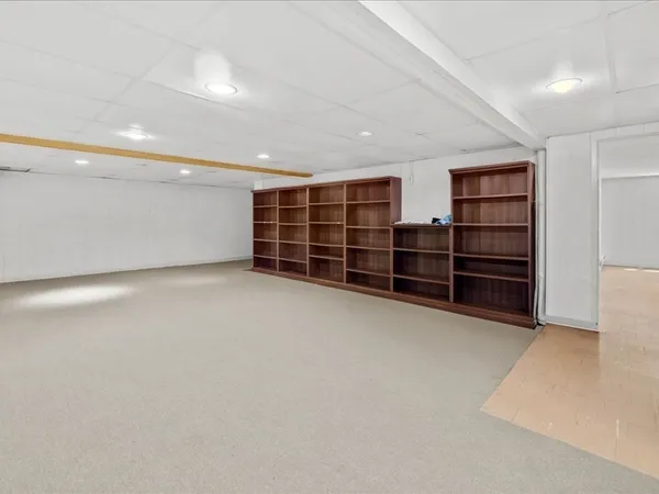 a view of backyard with patio