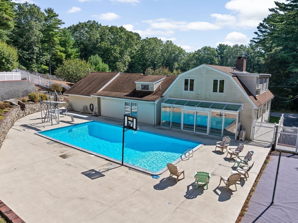 18 James Road Duxbury, MA 02332 - Photo 4 of 34 a front view of house with yard outdoor seating and green space