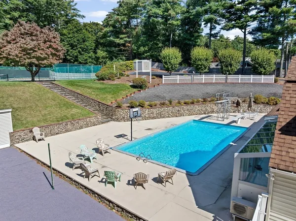 an aerial view of a house with outdoor space