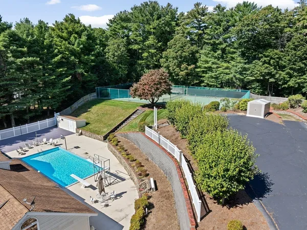 a view of a swimming pool with a patio