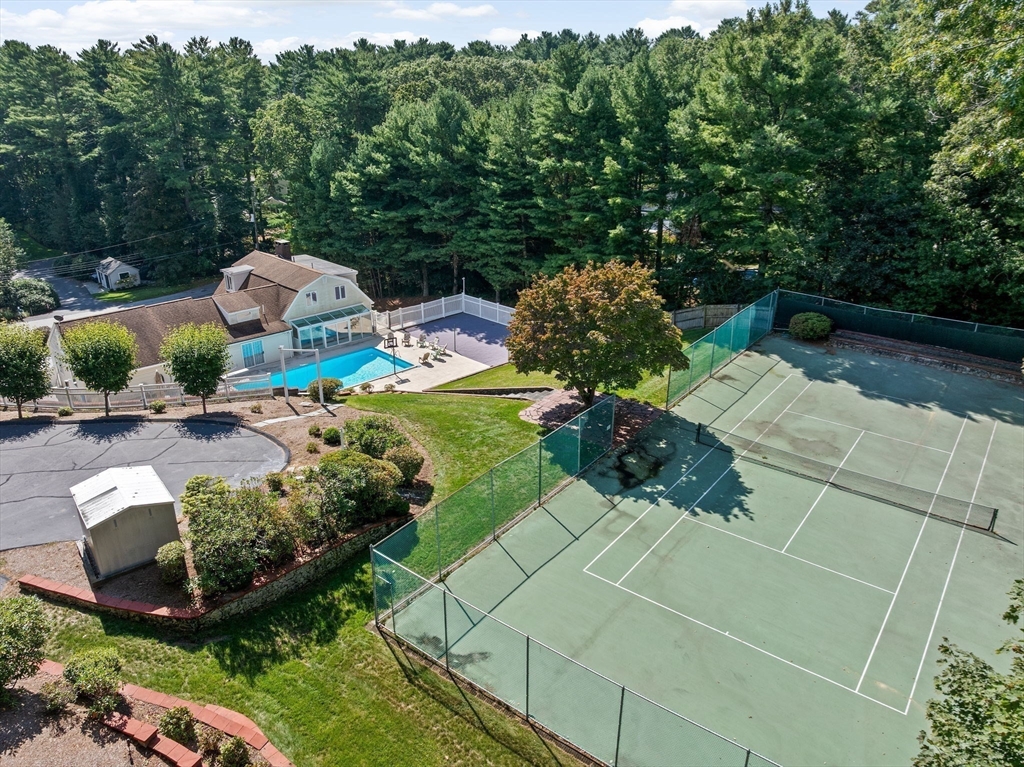 18 James Road Duxbury, MA 02332 - Photo 7 of 34 a view of a garden with plants and large trees