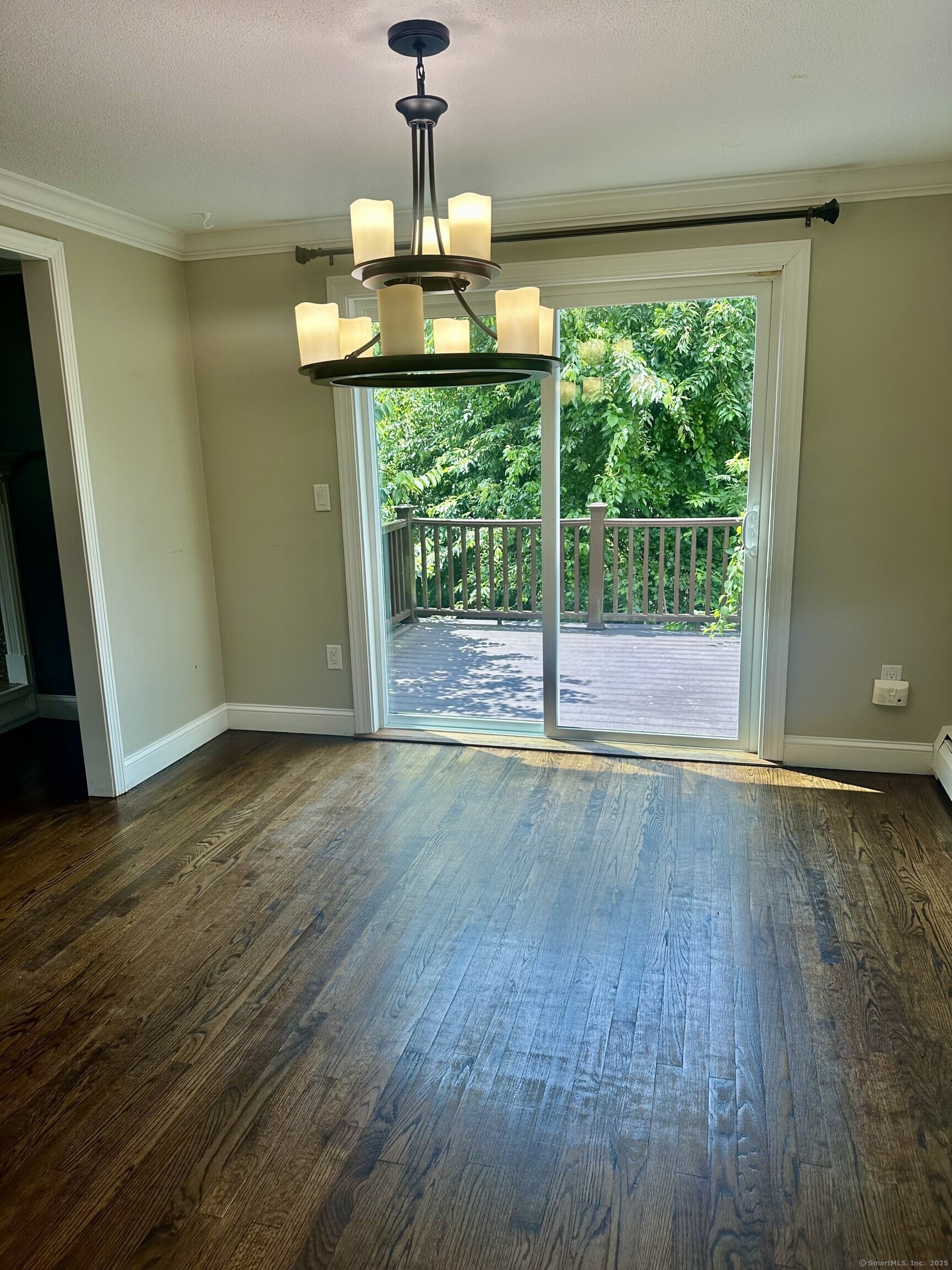 254 Sand Hill Road South Windsor, CT 06074 - Photo 5 of 20 a view of a room with wooden floor swimming pool and outdoor space