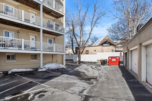 a front view of a building with street view and glass windows