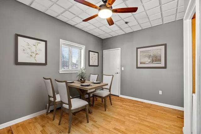 a view of a dining room with furniture