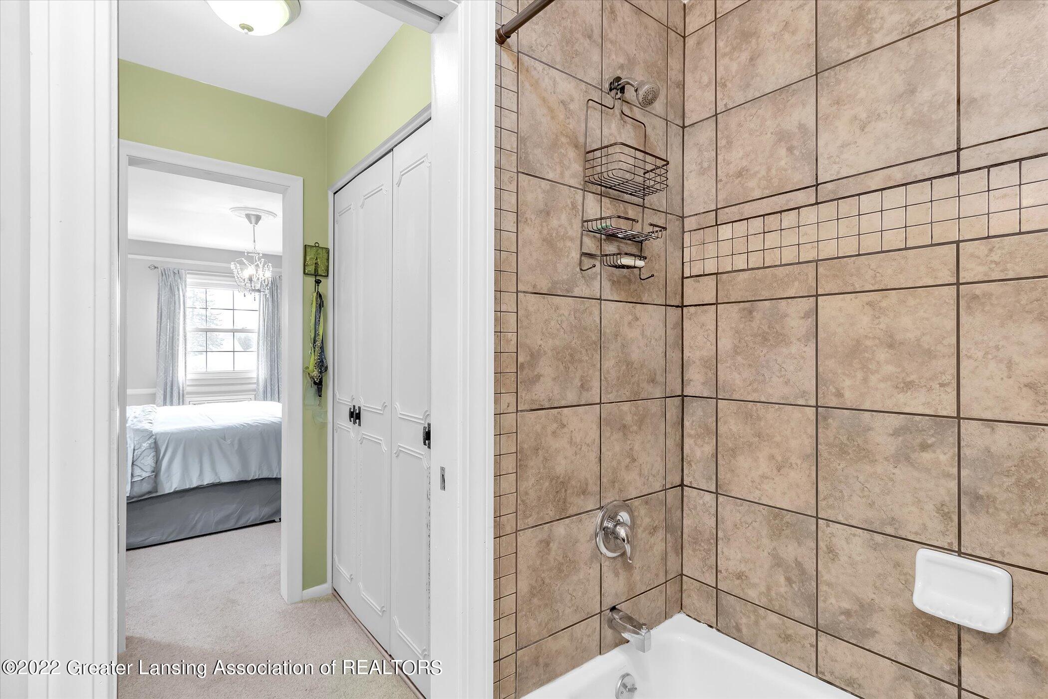 1730 Wellington Road, Unit 7 Lansing, MI 48910 - Photo 23 of 34 28-1730-Wellington-Rd-WindowStill-Real-E