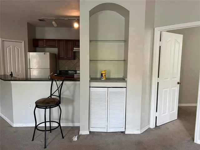 a room with a table and a chair