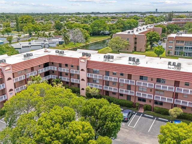 a view of a building and a garden