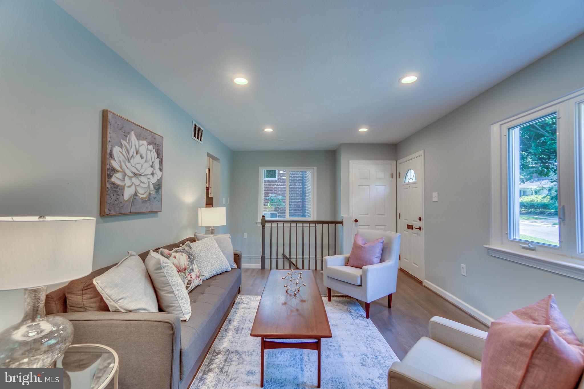 11517 Mapleview Drive Silver Spring, MD 20902 - Photo 5 of 18 a living room with furniture and a window