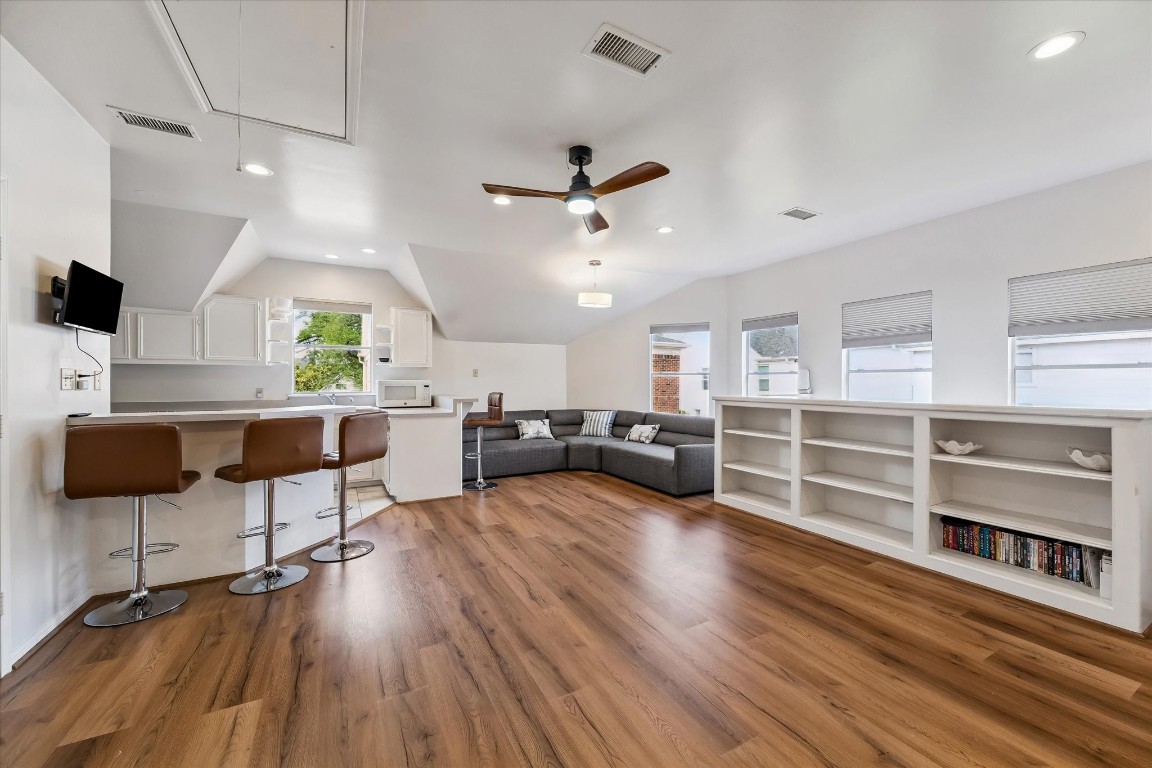 1925 Banks Street Houston, TX 77098 - Photo 31 of 38 Another view of the living room area and kitchen of the spacious garage apartment
