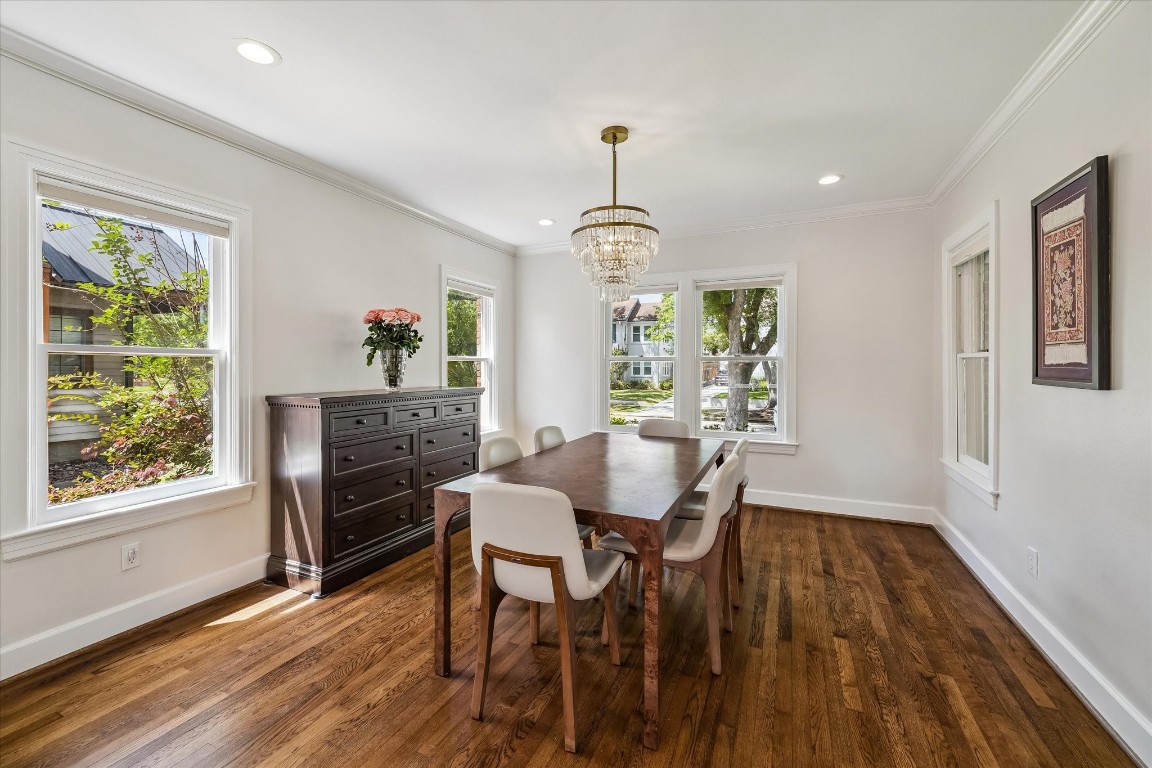 1925 Banks Street Houston, TX 77098 - Photo 5 of 38 From the right of the entryway you will find a bright and inviting dining room with hardwood floors, large windows offering natural light, a beautiful chandelier, and ample space for entertaining.