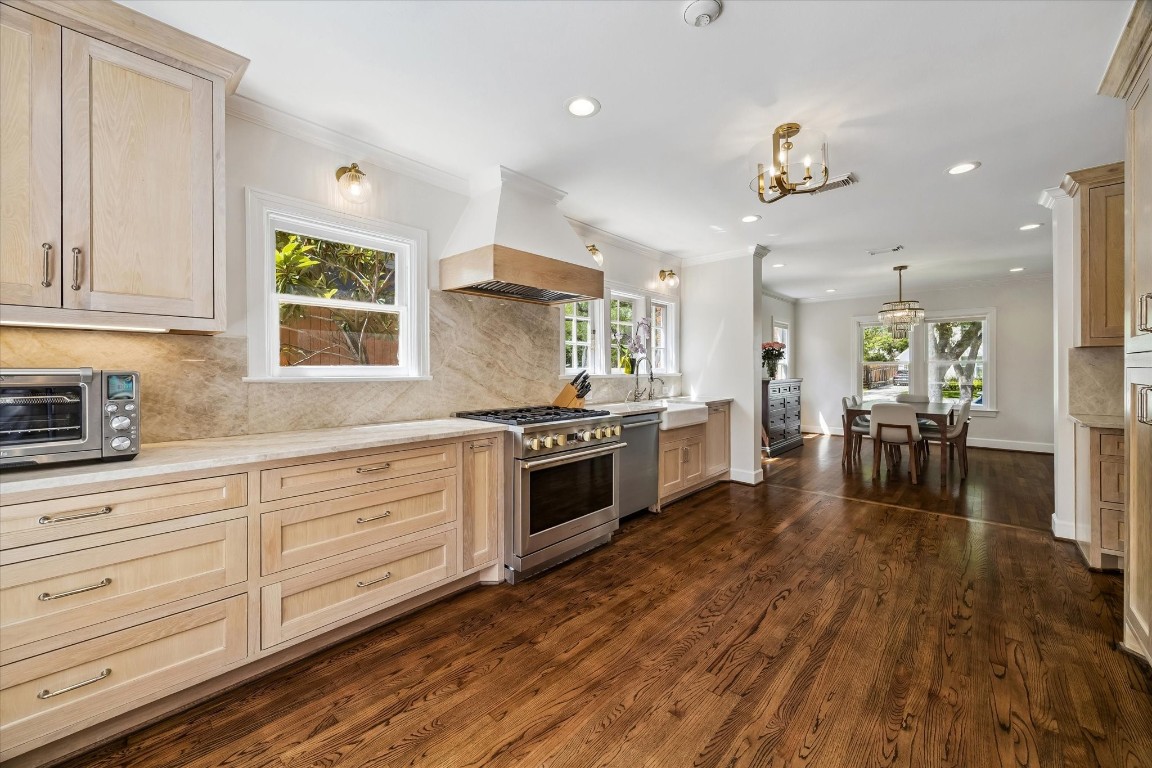 1925 Banks Street Houston, TX 77098 - Photo 8 of 38 Another view of the kitchen. The previous homeowner added an antique island as an option if an island is wanted. There is plenty of counter space so it is not needed.