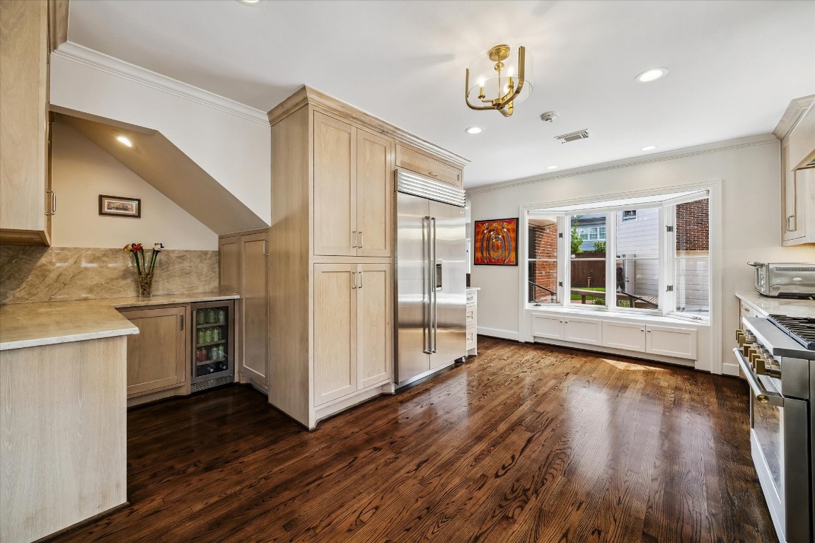 1925 Banks Street Houston, TX 77098 - Photo 9 of 38 Another view of the kitchen featuring the breakfast nook that opens up into the living room.