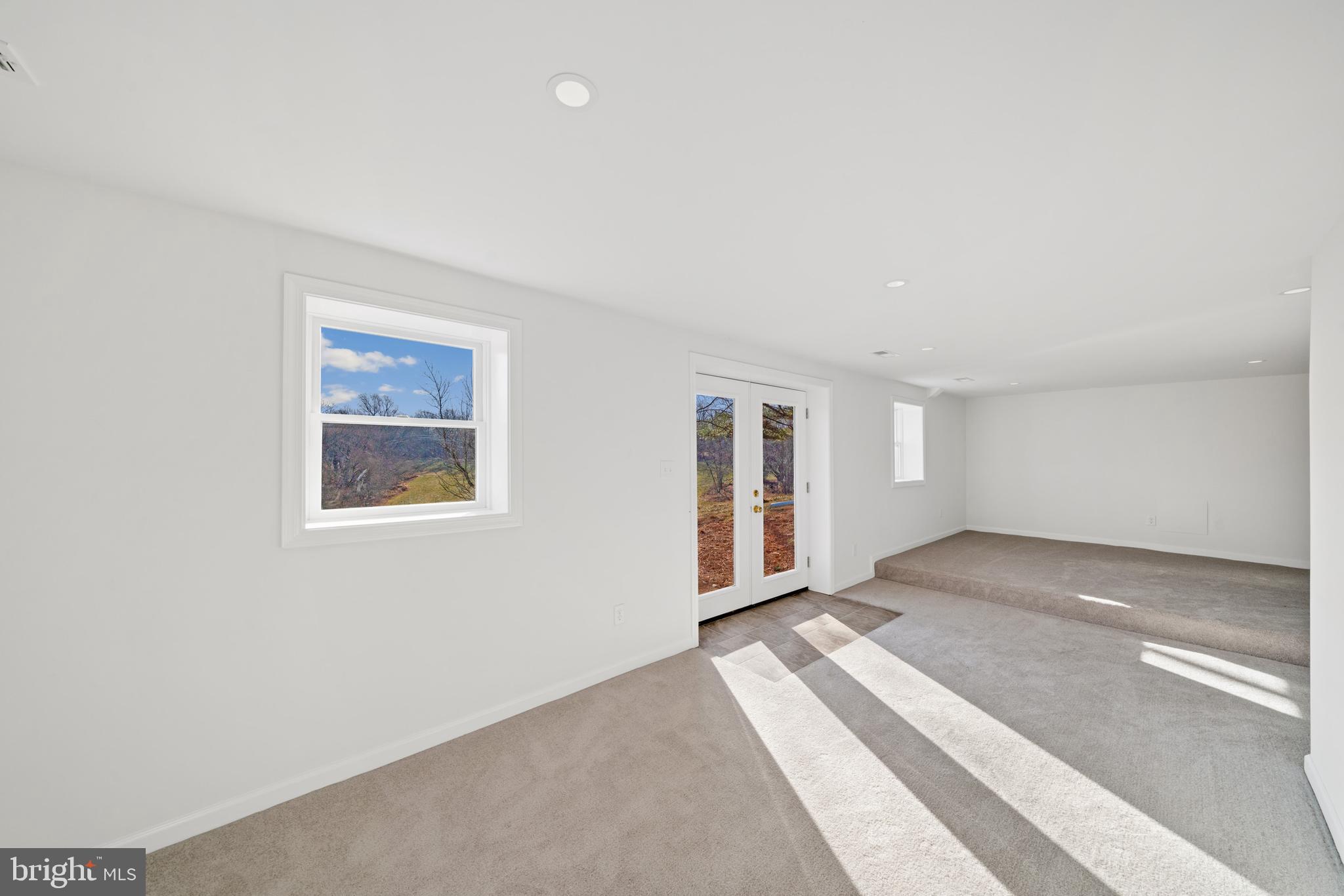 5209 Woodville Road Mount Airy, MD 21771 - Photo 31 of 90 an empty room with windows