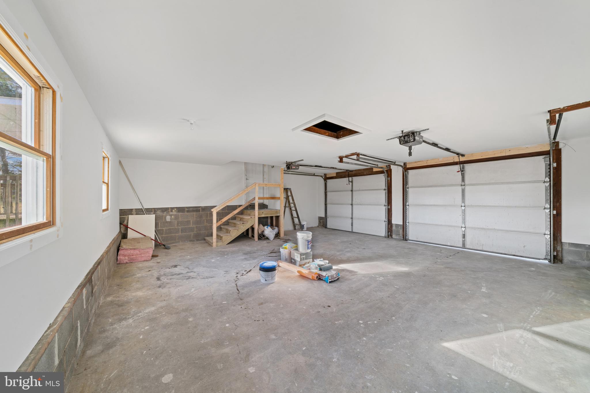 5209 Woodville Road Mount Airy, MD 21771 - Photo 39 of 90 a view of a garage with stairs