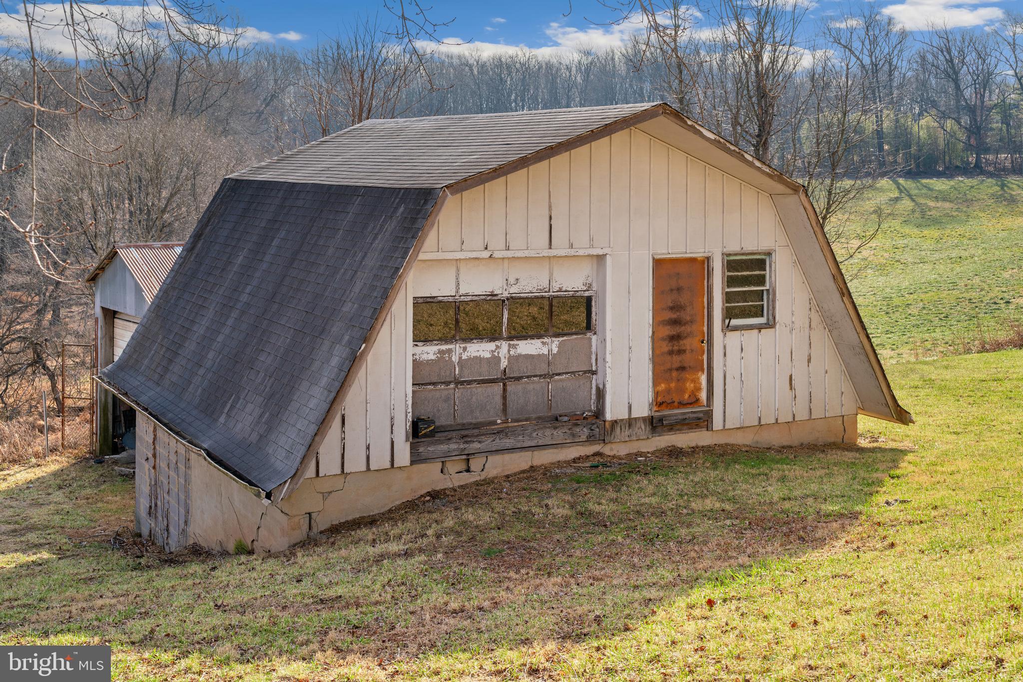 5209 Woodville Road Mount Airy, MD 21771 - Photo 53 of 90 a view of a small house with backyard