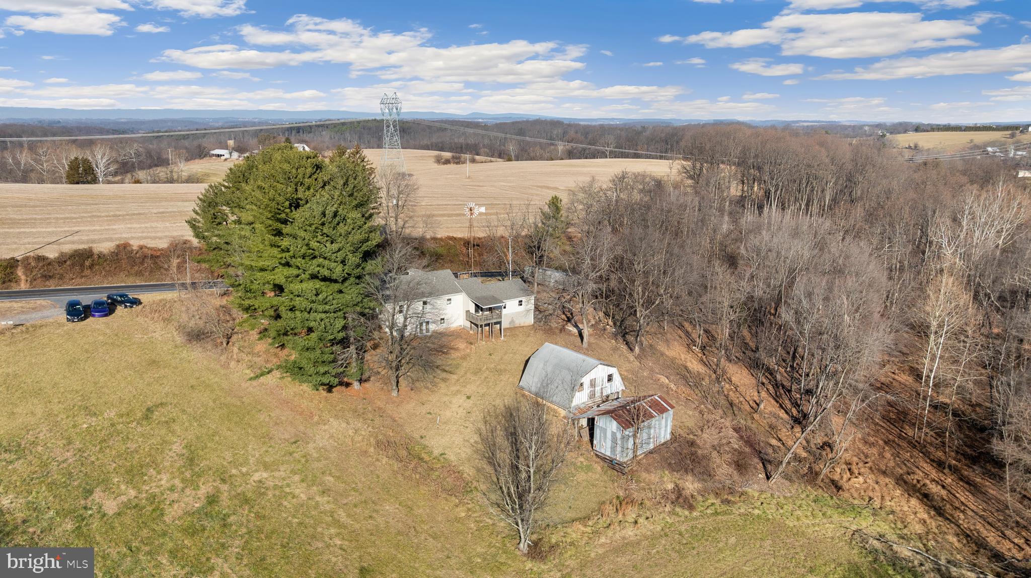 5209 Woodville Road Mount Airy, MD 21771 - Photo 63 of 90 a view of a lake with a mountain