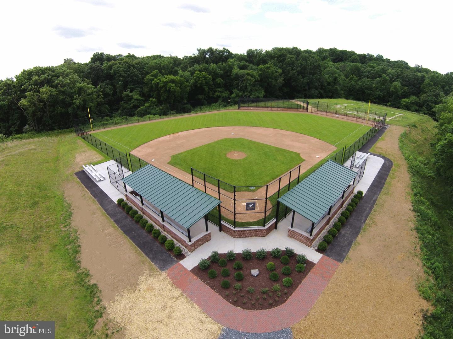 5209 Woodville Road Mount Airy, MD 21771 - Photo 65 of 90 a view of a swimming pool with a patio