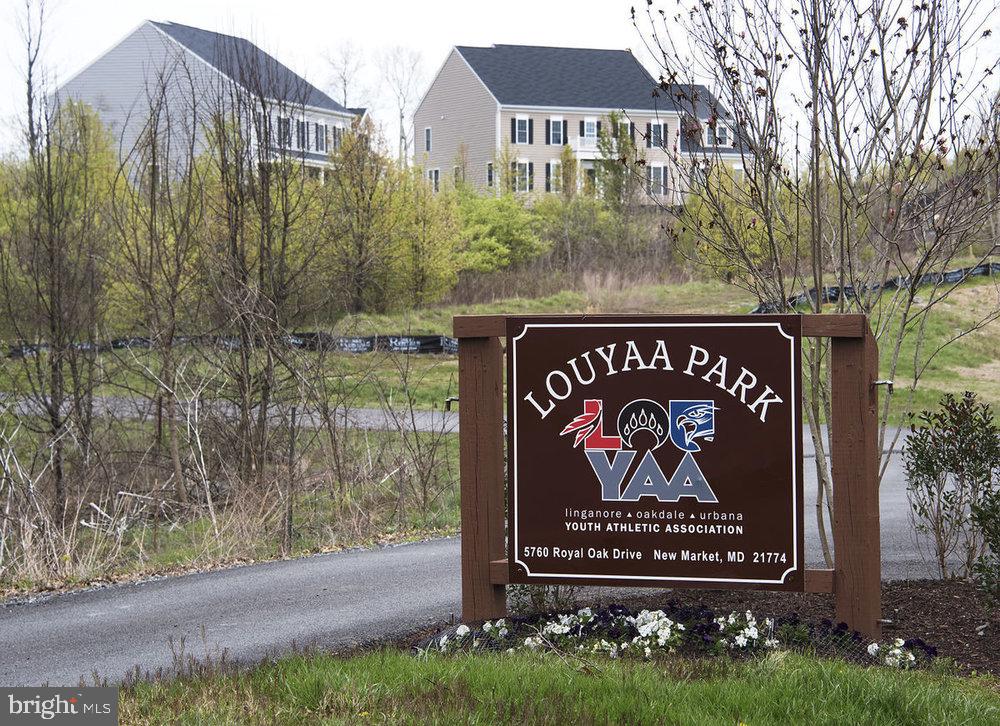 5209 Woodville Road Mount Airy, MD 21771 - Photo 67 of 90 a sign on the side of a road