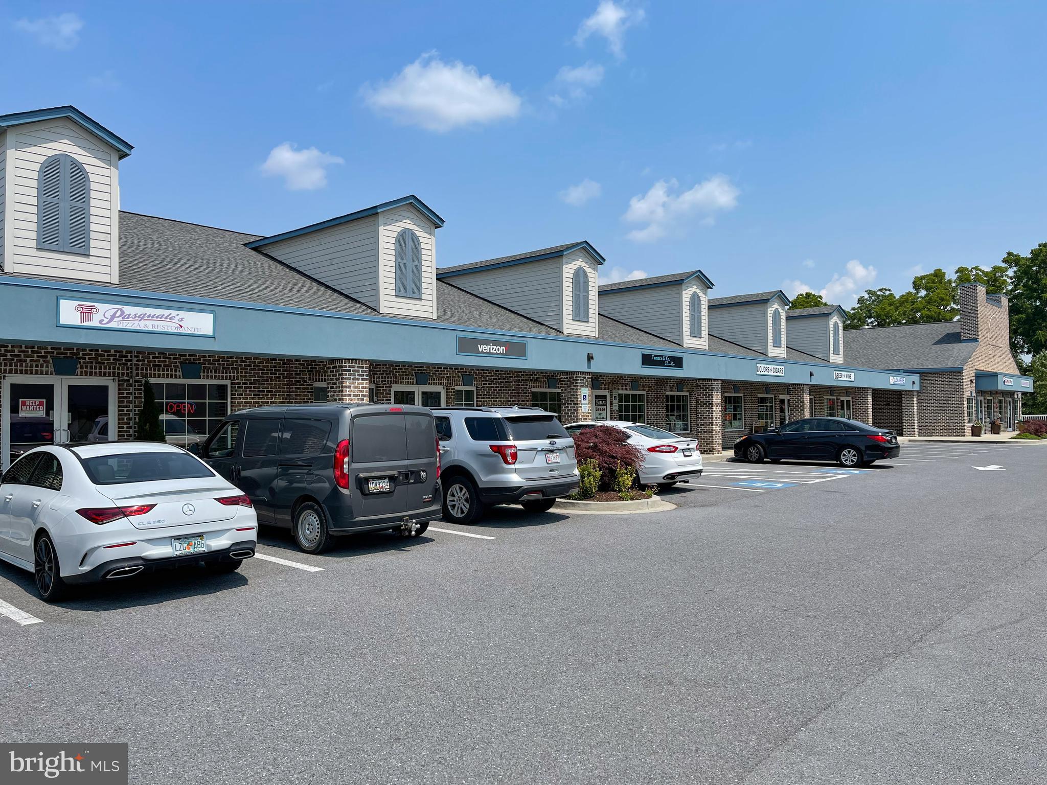 5209 Woodville Road Mount Airy, MD 21771 - Photo 73 of 90 a car parked in front of a building