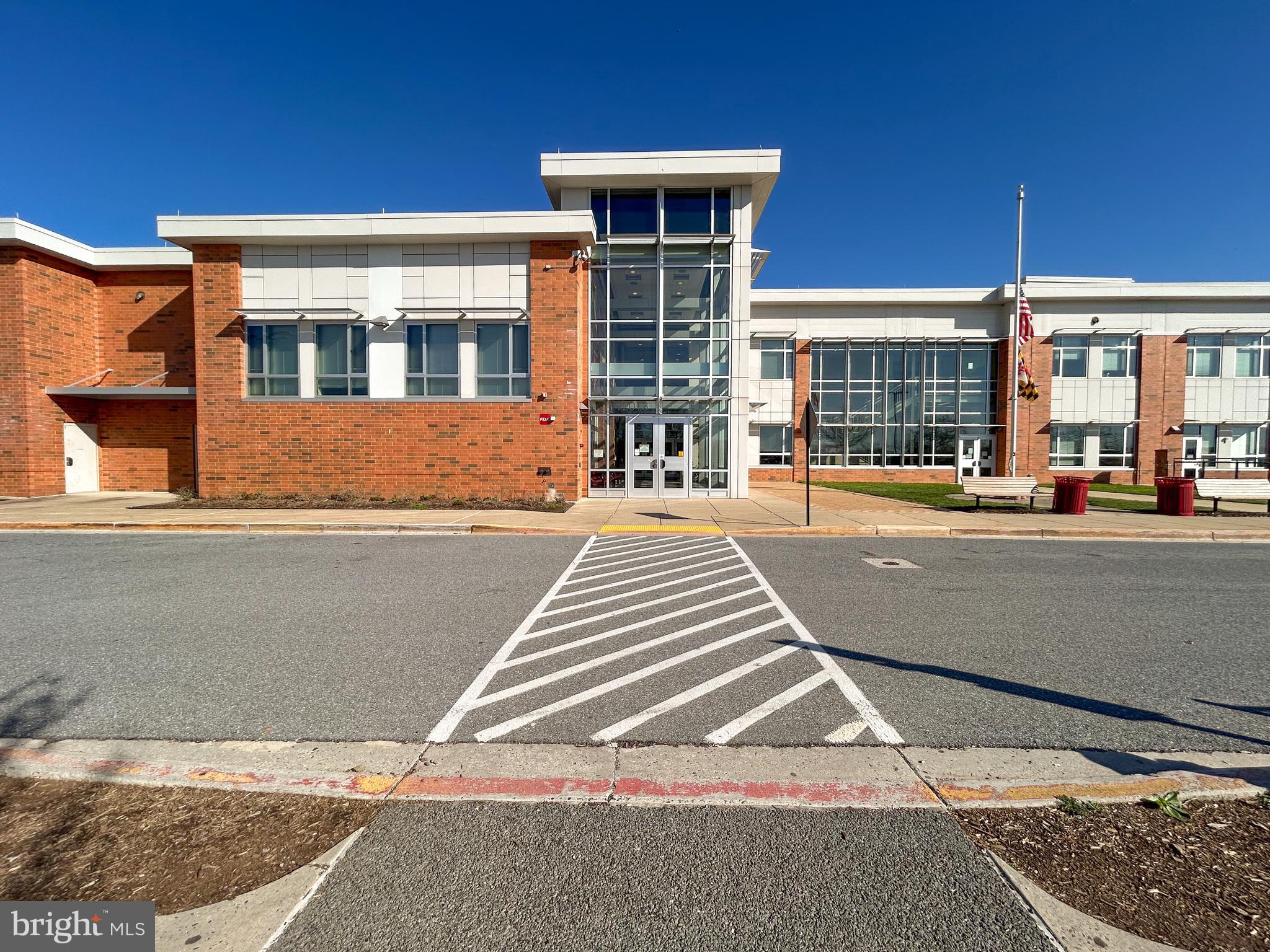 5209 Woodville Road Mount Airy, MD 21771 - Photo 86 of 90 a front view of a multi story building