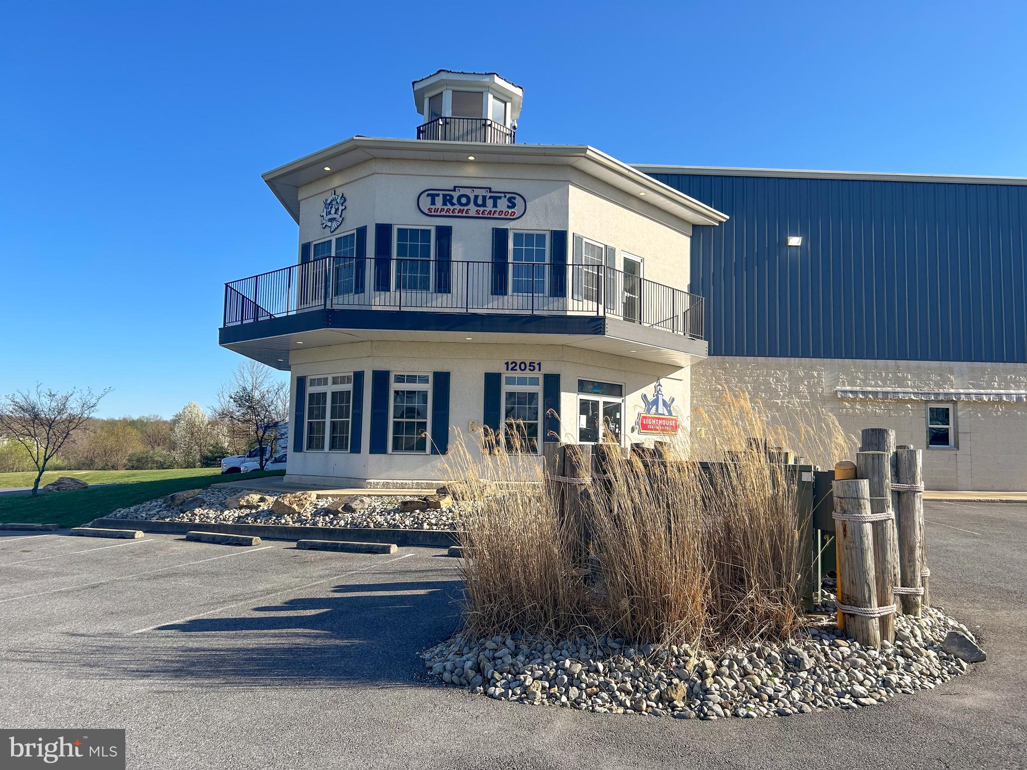 5209 Woodville Road Mount Airy, MD 21771 - Photo 87 of 90 a front view of a house with a yard