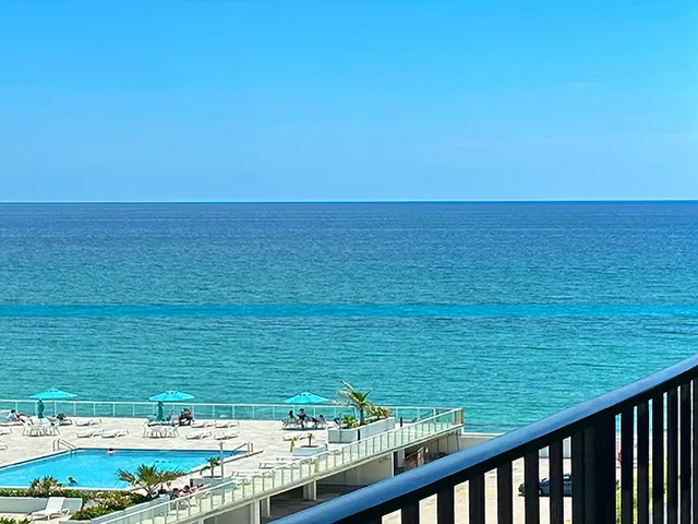 a view of an ocean from a balcony
