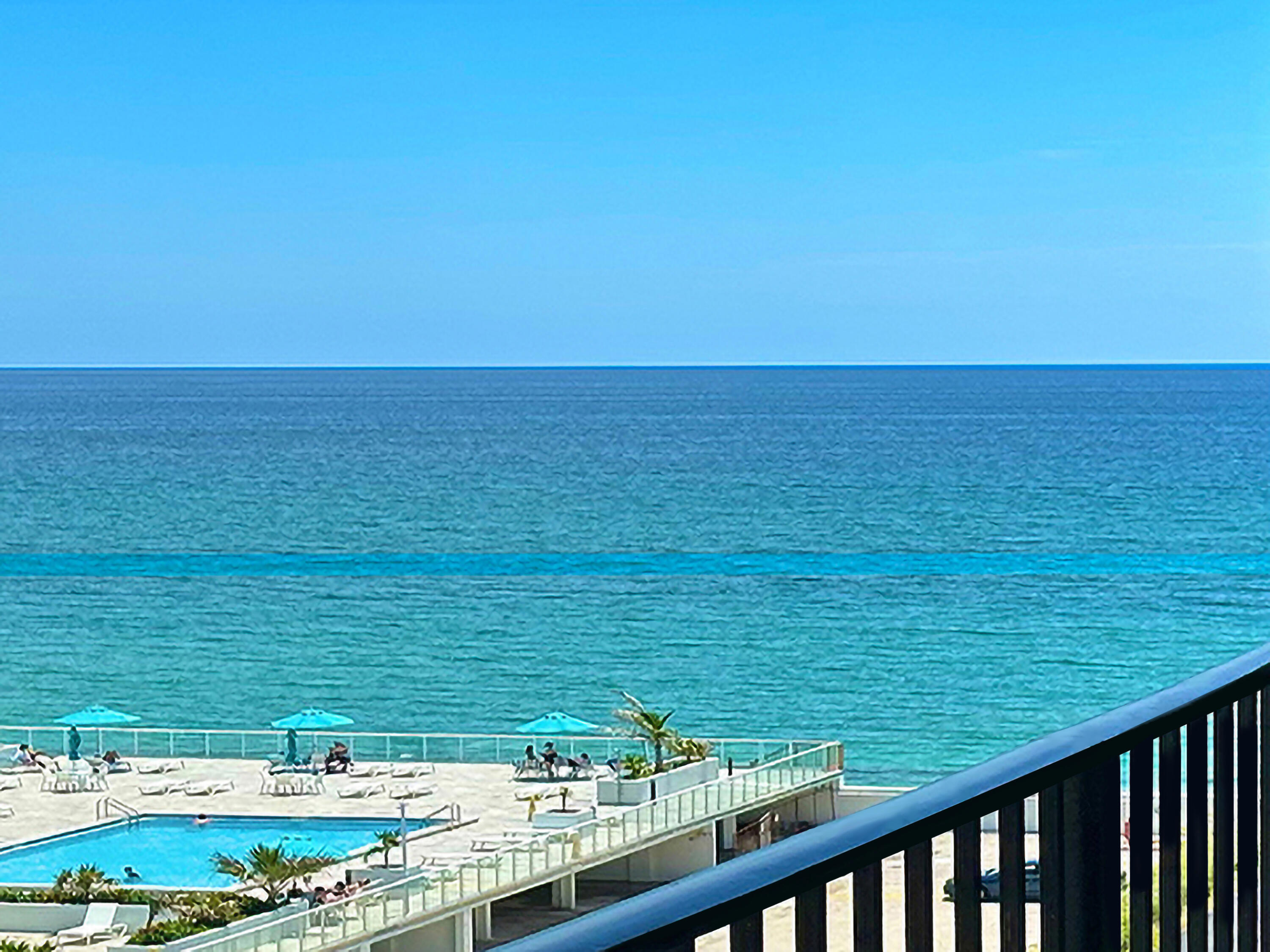 a view of an ocean from a balcony