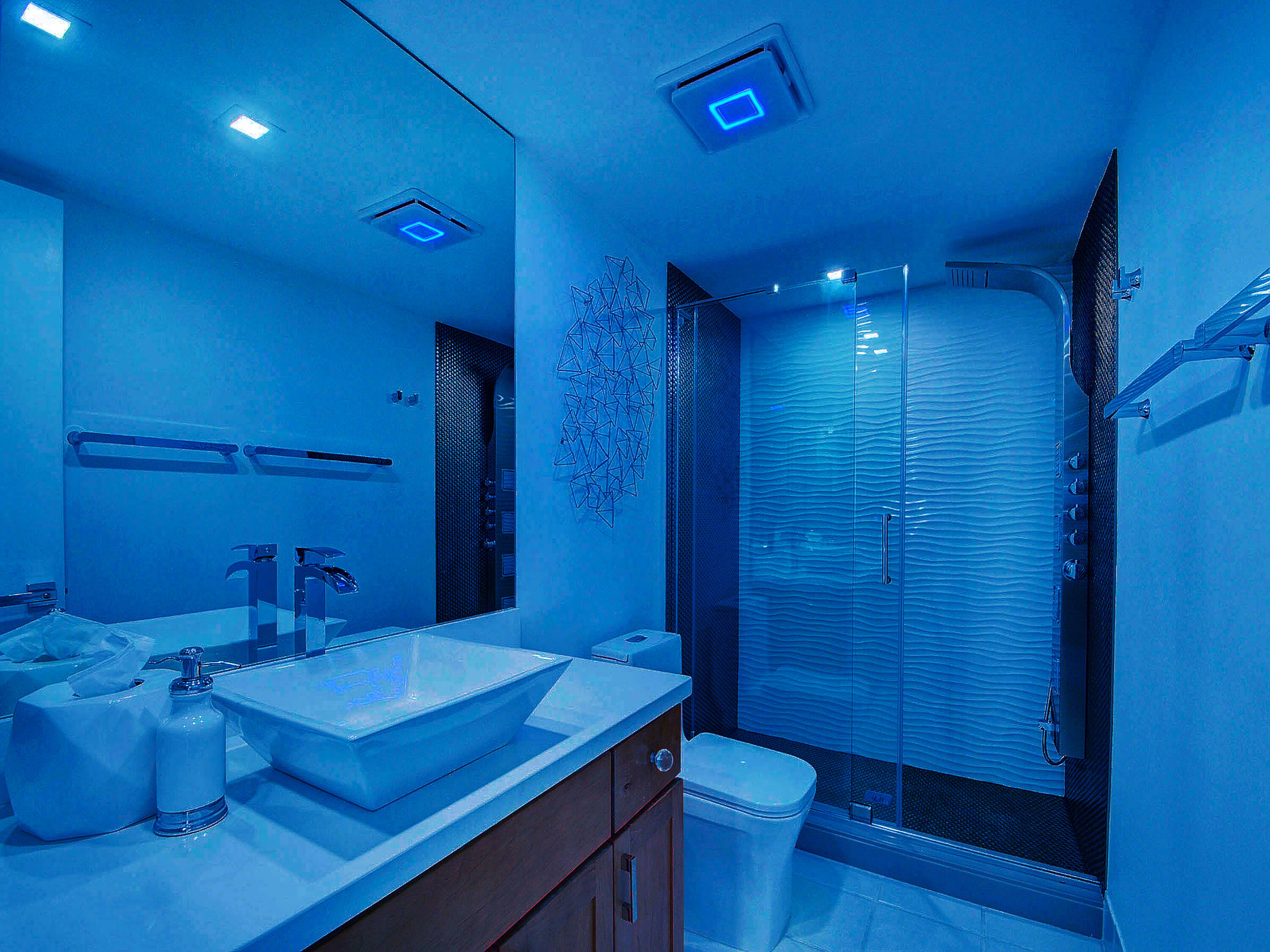 3460 South Ocean Boulevard, Unit 7110 Palm Beach, FL 33480 - Photo 16 of 23 a bathroom with a sink shower vanity and a toilet