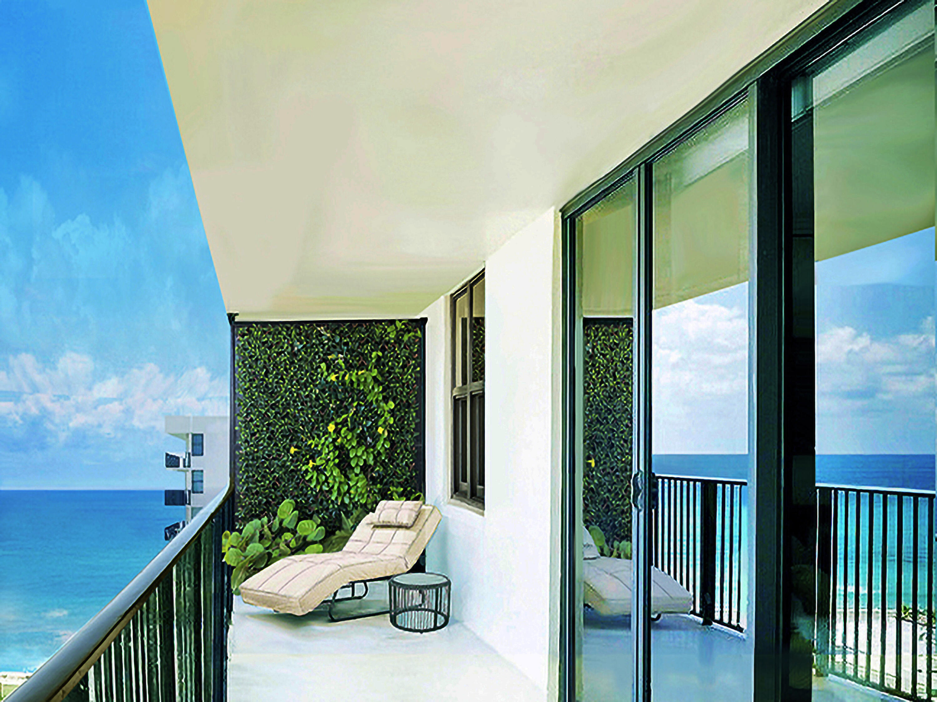 3460 South Ocean Boulevard, Unit 7110 Palm Beach, FL 33480 - Photo 3 of 23 a view of a balcony with chair and the porch