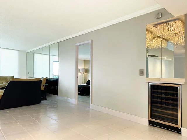 a view of room with furniture and windows