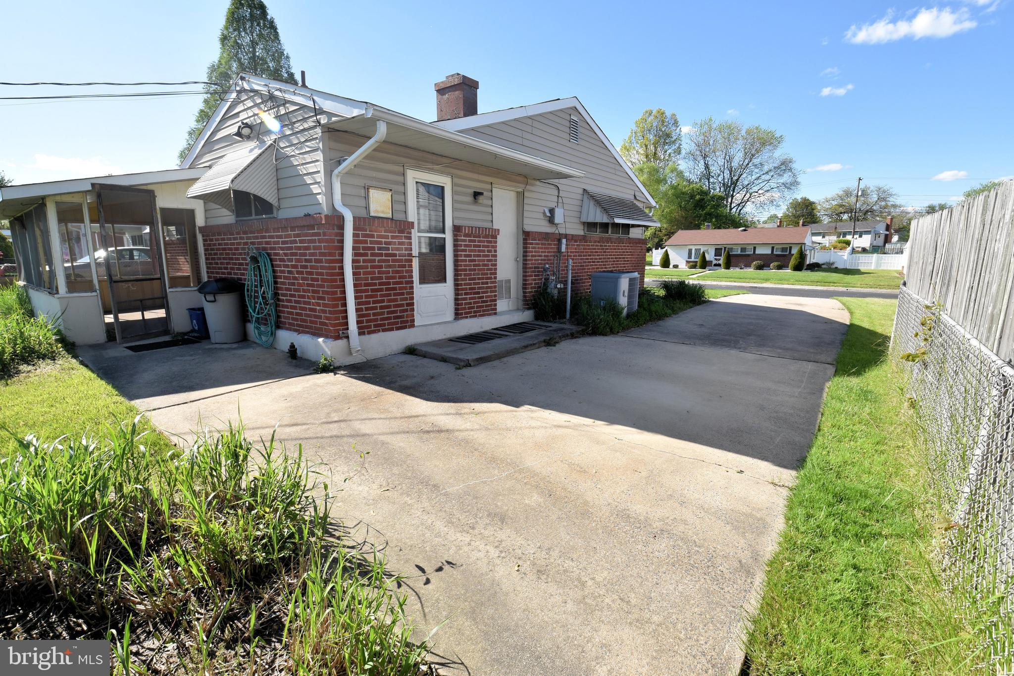 2421 Ellis Road Baltimore, MD 21234 - Photo 6 of 27 View of screened porch & super long driveway