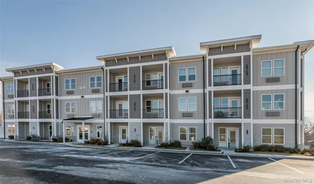 a front view of a building with street view