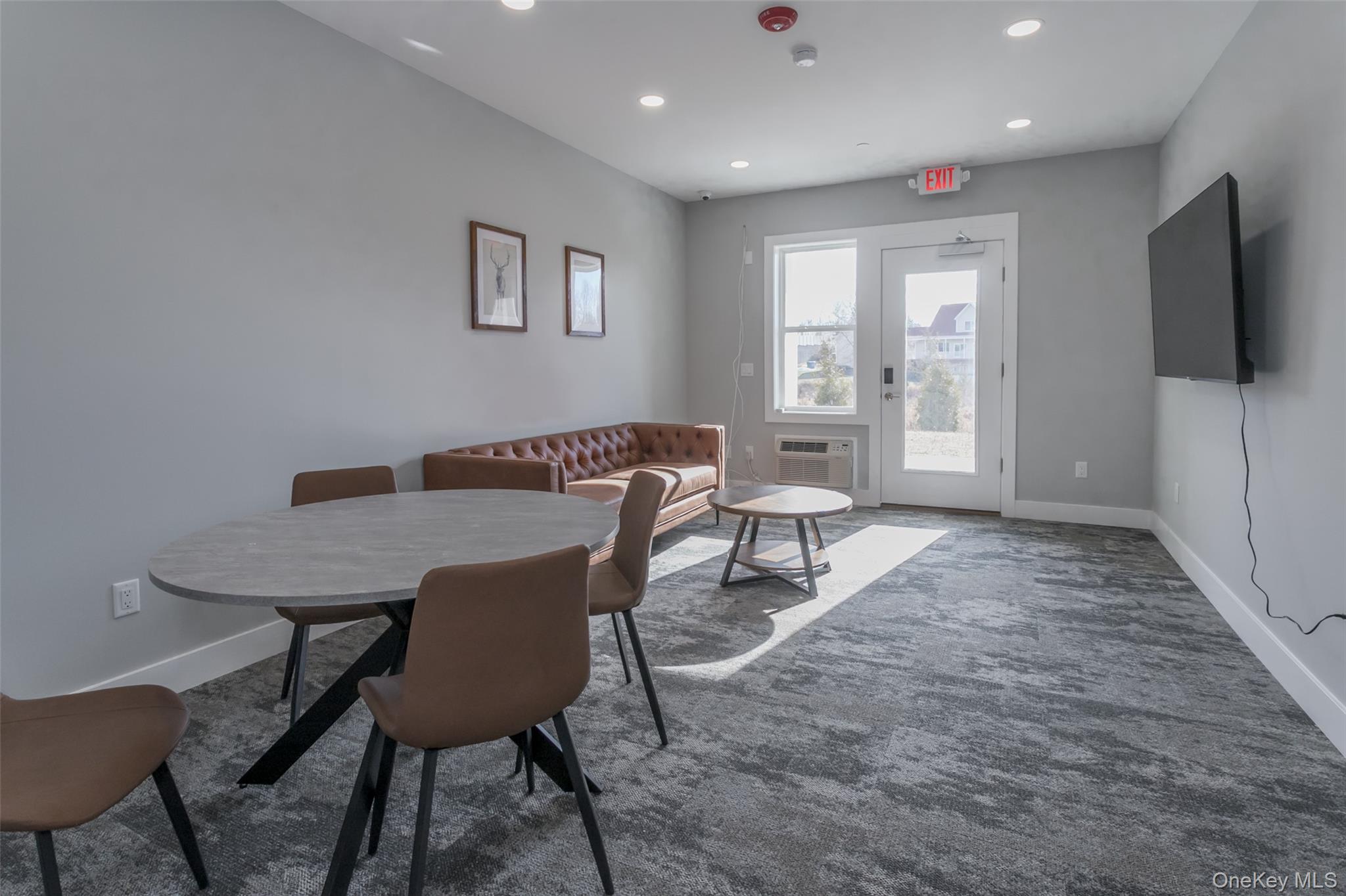 124 South Main Street, Unit 2203 Florida, NY 10921 - Photo 15 of 16 a view of a livingroom with furniture window and wooden floor