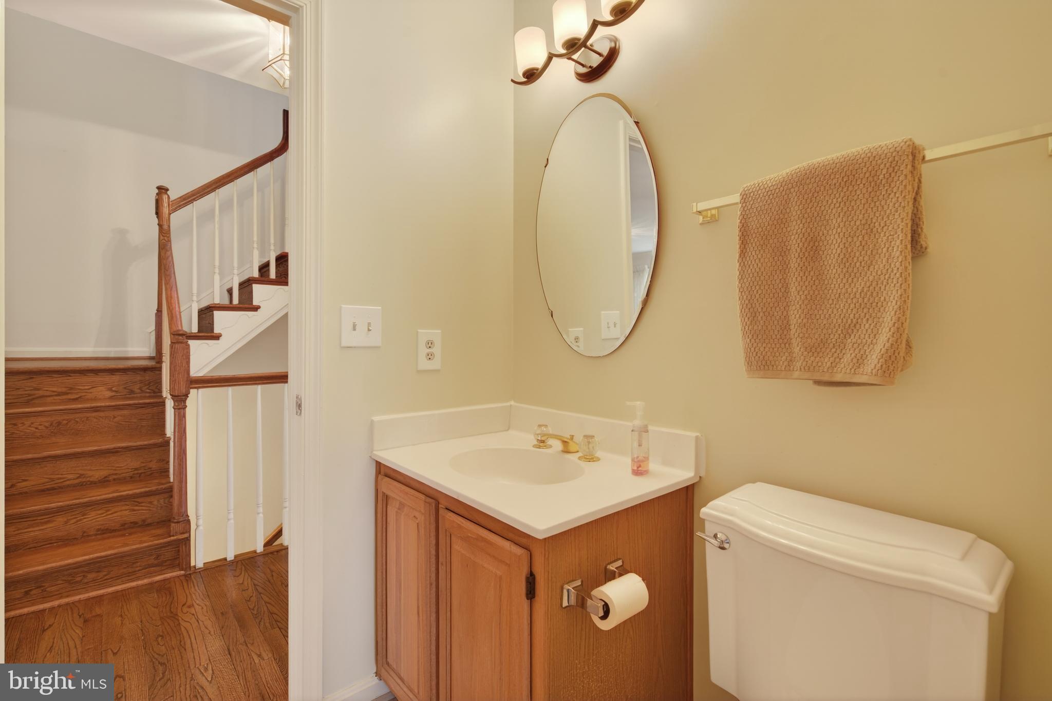 8901 Ellsworth Court Silver Spring, MD 20910 - Photo 22 of 43 a bathroom with a sink and a mirror