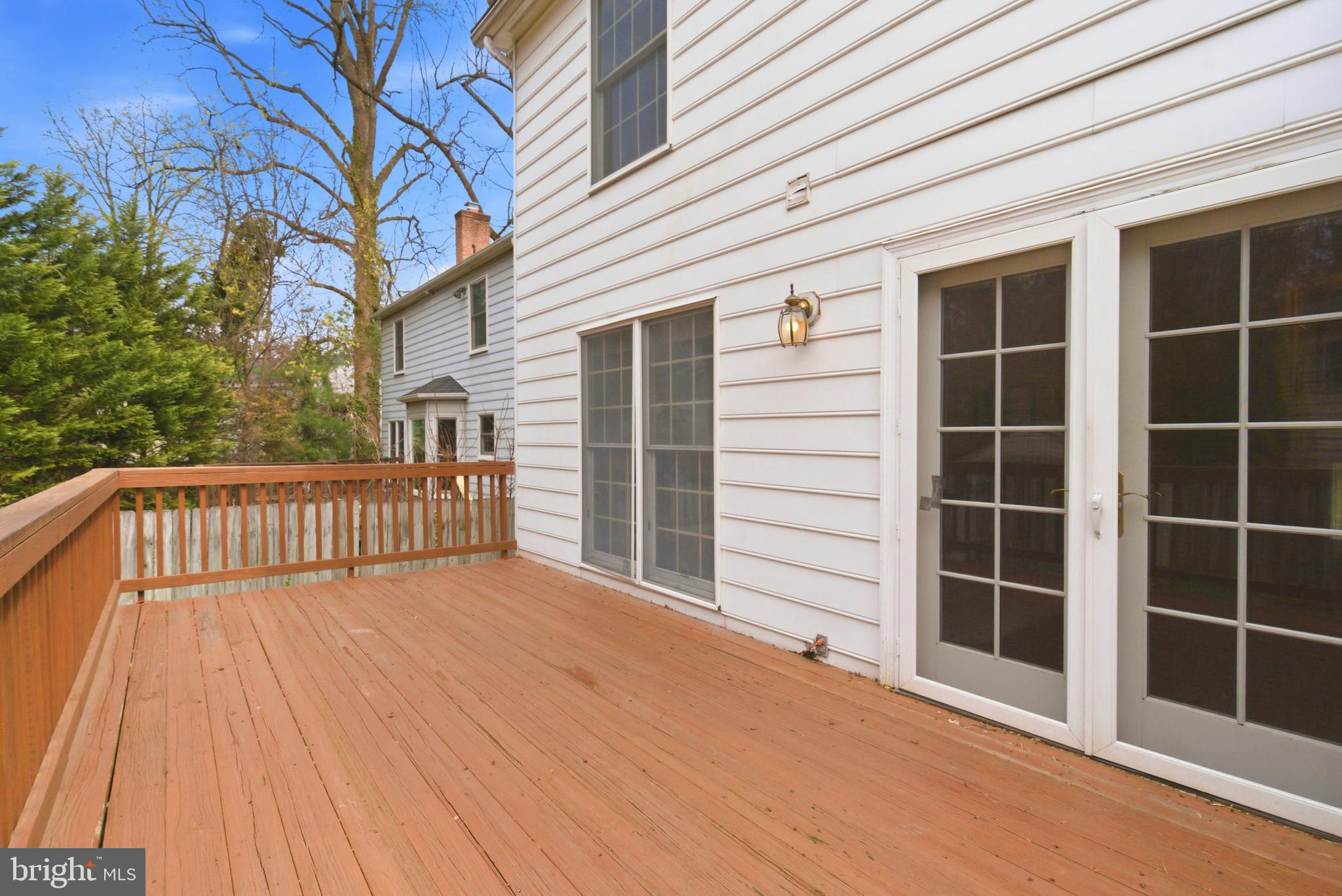 8901 Ellsworth Court Silver Spring, MD 20910 - Photo 23 of 43 a view of backyard with deck and wooden floor