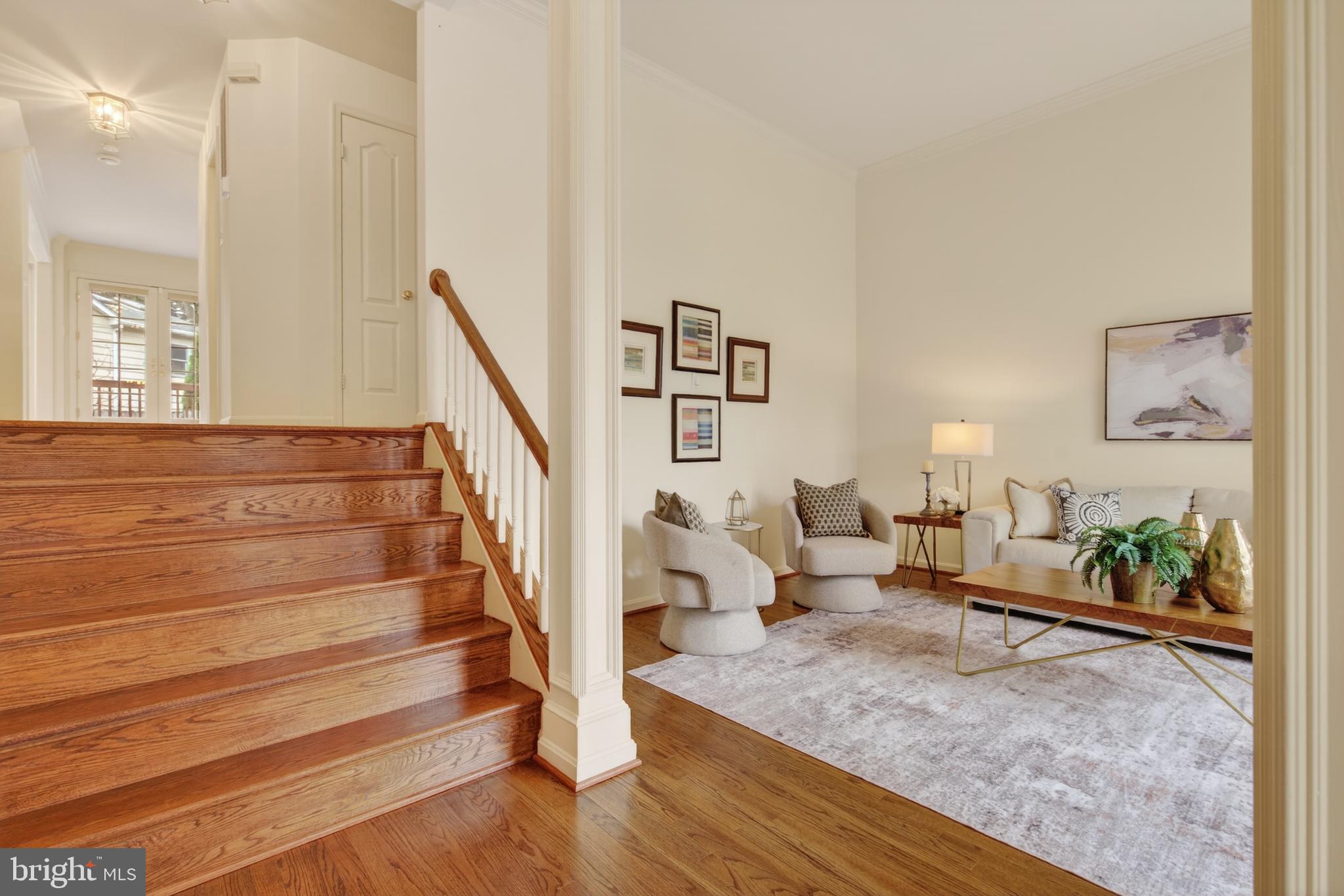 8901 Ellsworth Court Silver Spring, MD 20910 - Photo 4 of 43 a living room with furniture and stairs